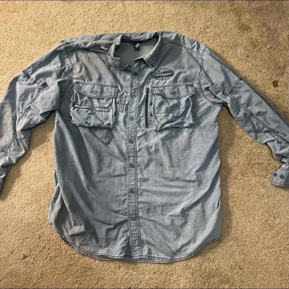 Gently used, has a few darker spots on front, needs a good ironing.